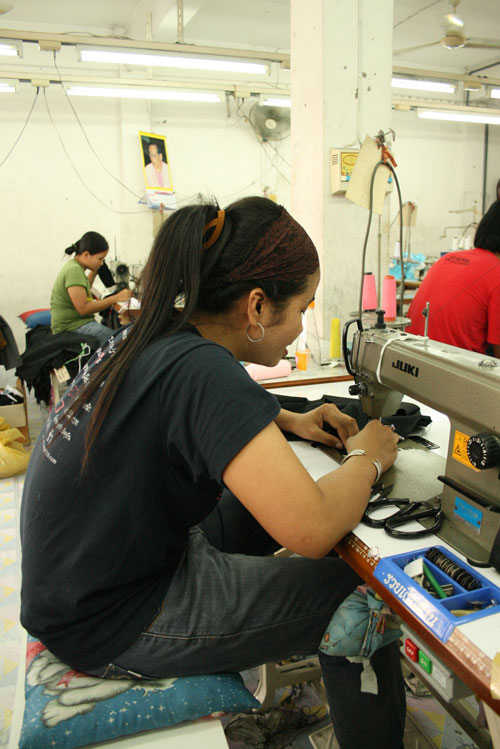 Thippawan Kwansook's sewing her dignified products at Dignity Returns Factory